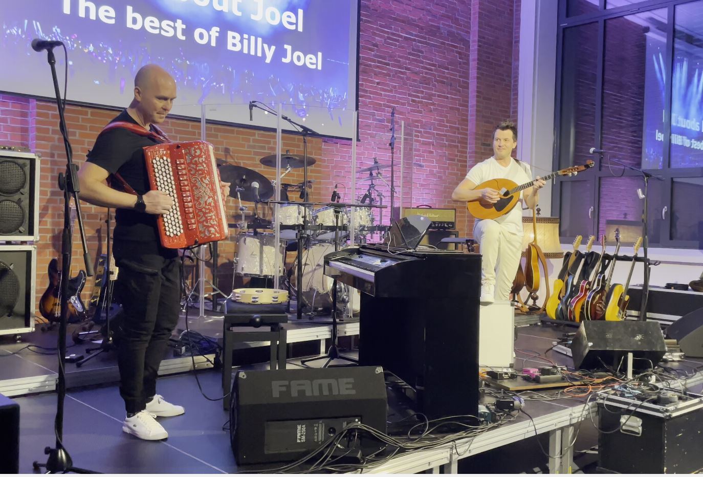 Bryats Band performing accordion and rock balalaika on stage